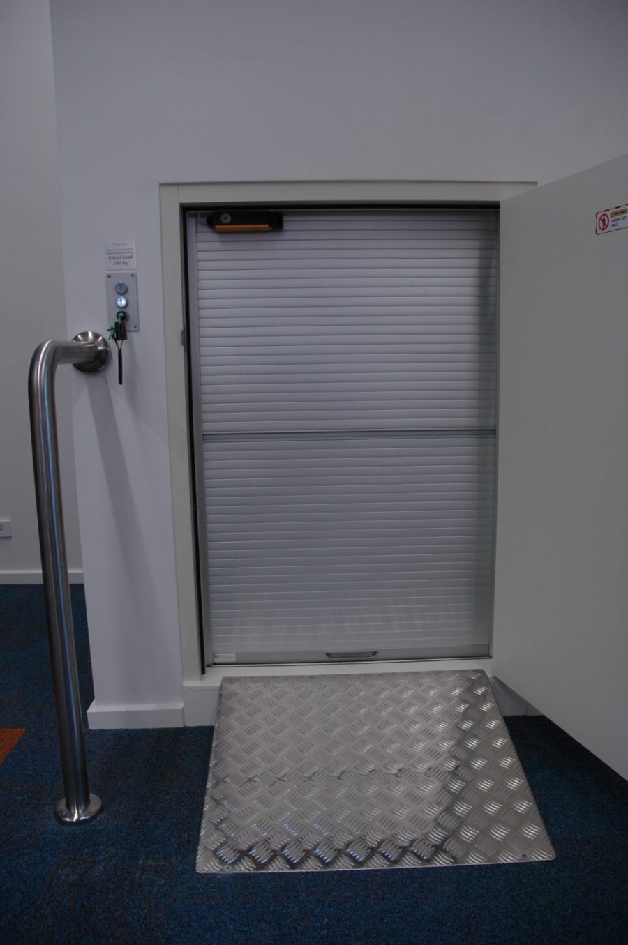 Custom floor-loading dumbwaiter